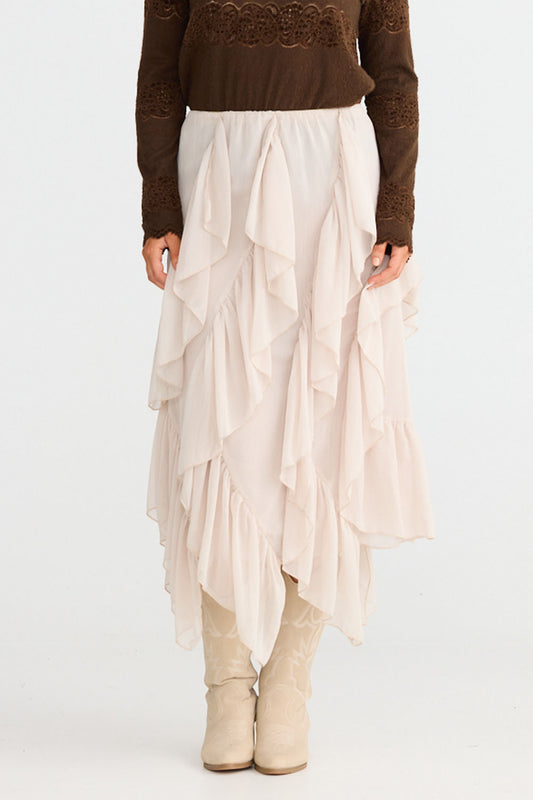 Model wearing Rafael Skirt in almond with elasticated waist, front view on white background