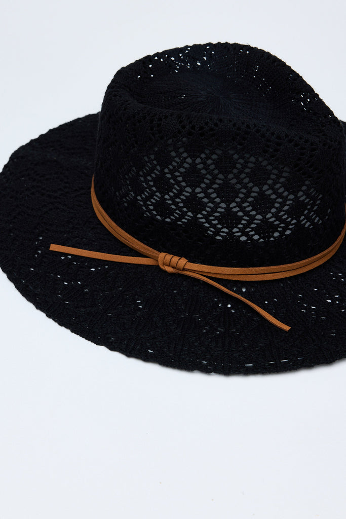 Black hat with a brown band on a white background