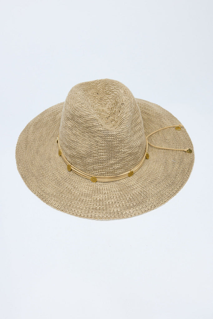 Beige straw hat with a wide brim on a light gray background