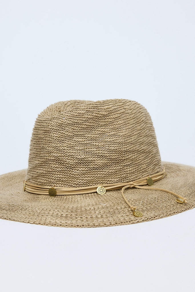 Beige straw hat with decorative band on a light gray background