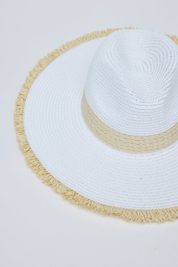 White straw hat with beige trim on a white background