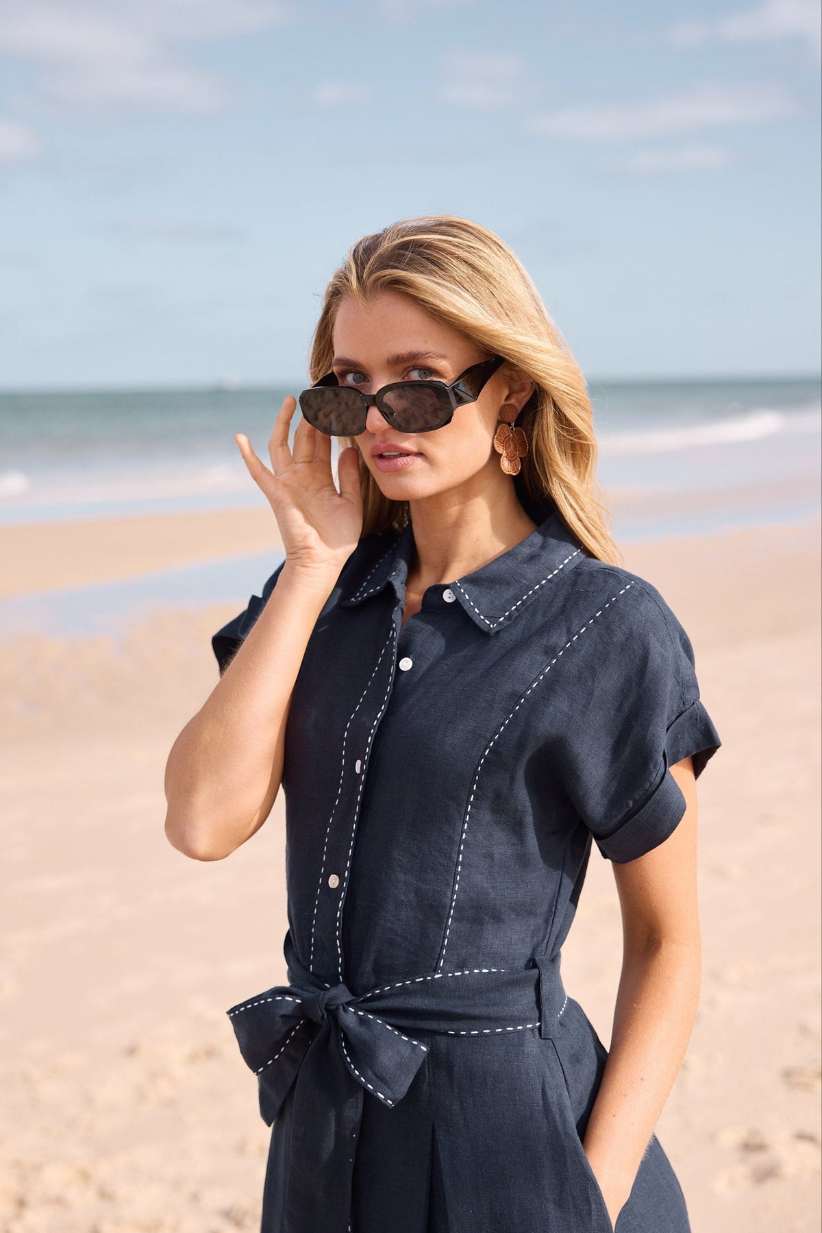 Model wearing black london sunglasses