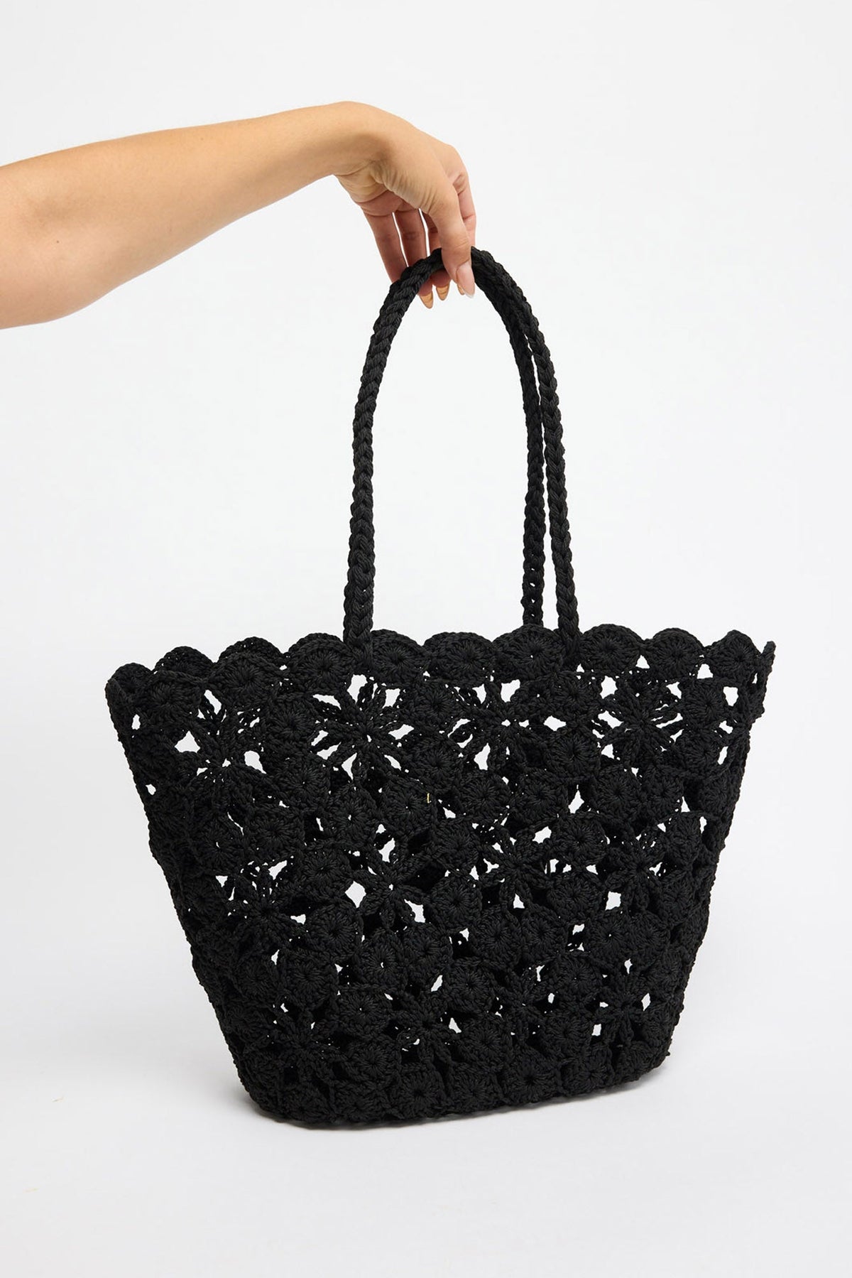 Lucy Basket in black, front view.