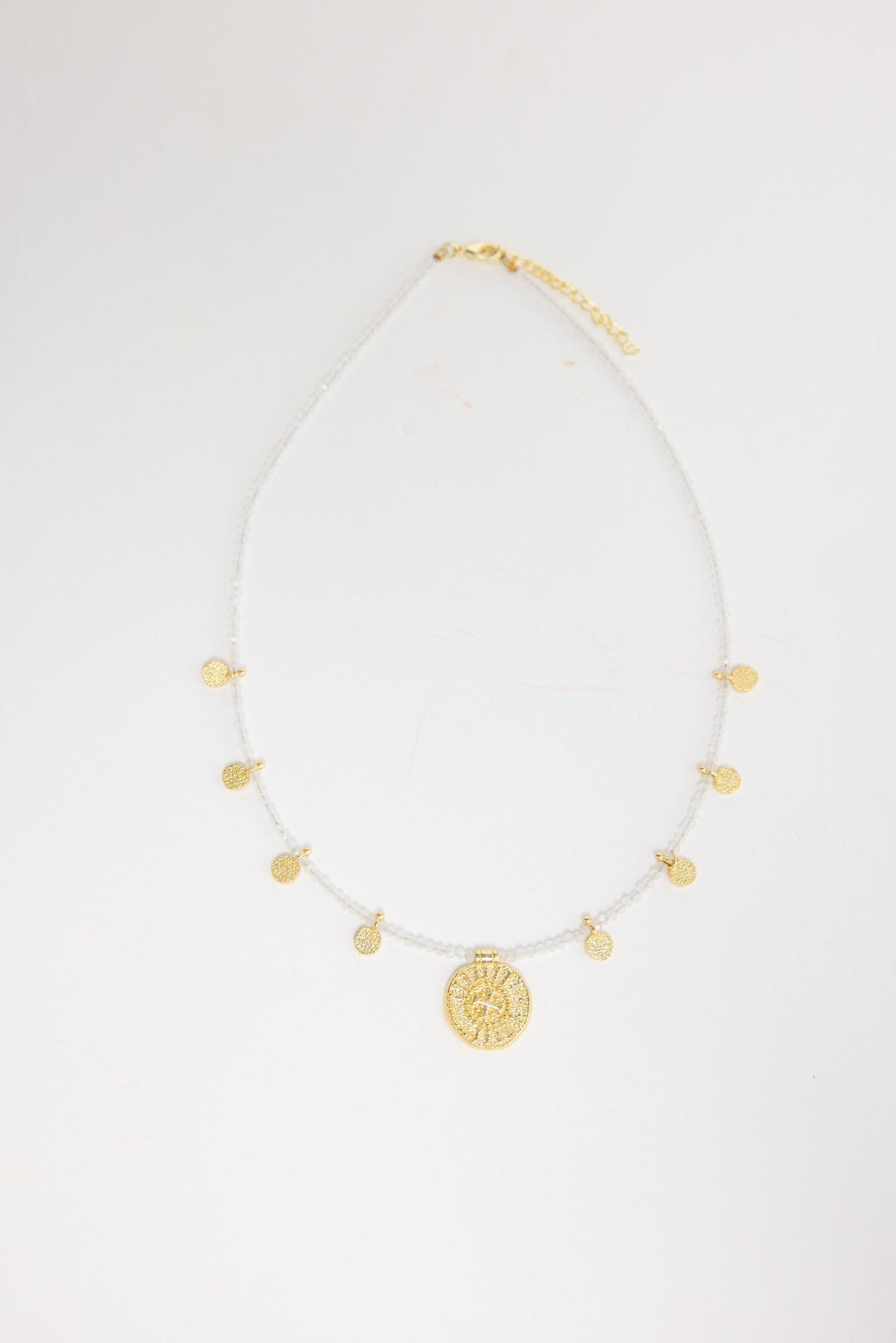 Shila Necklace in white, front view.