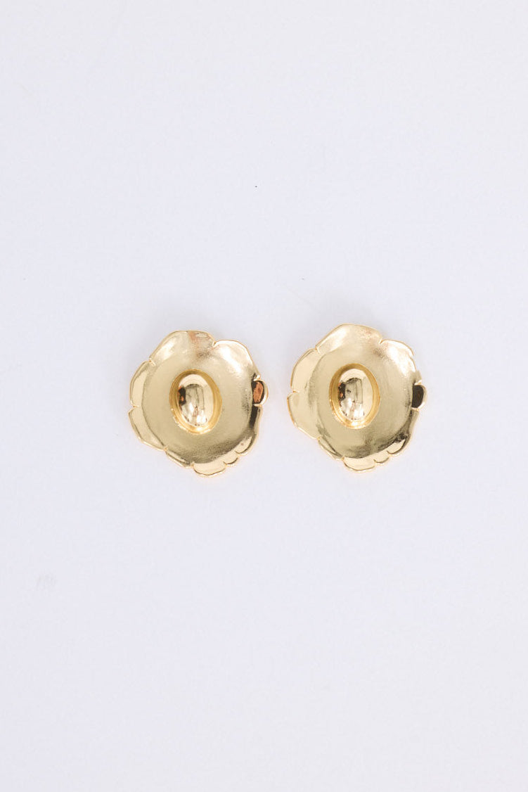 Flora Earrings in gold with sculptural floral detailing, front view on white background