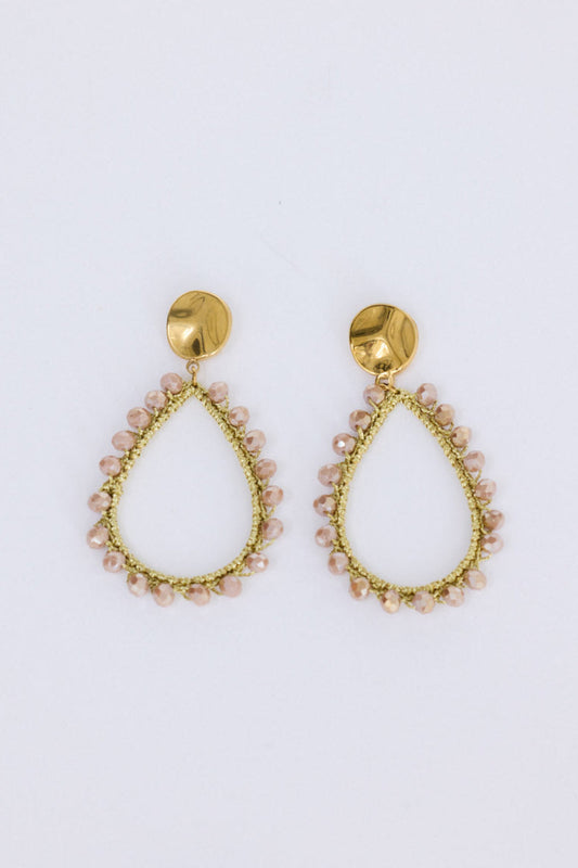 Sawyer Earrings in blush with delicate beaded trim detailing, angled view on white background