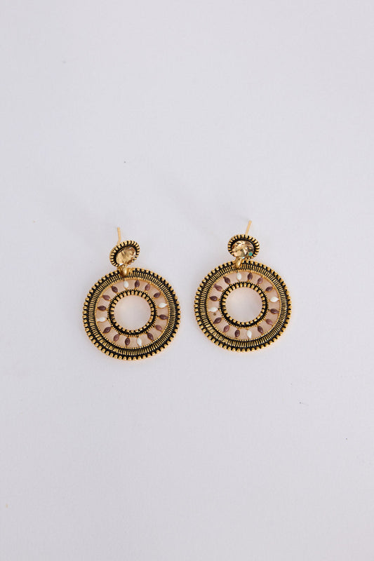 Eclipse Earrings in gold with detailed textured finish, front view on white background