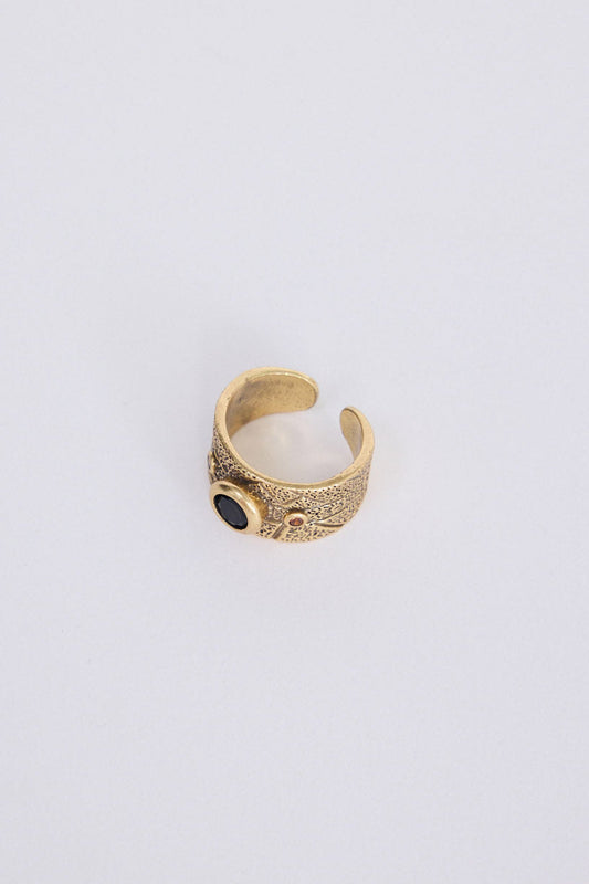 Calypso Ring in gold with stone detail, front view on white background
