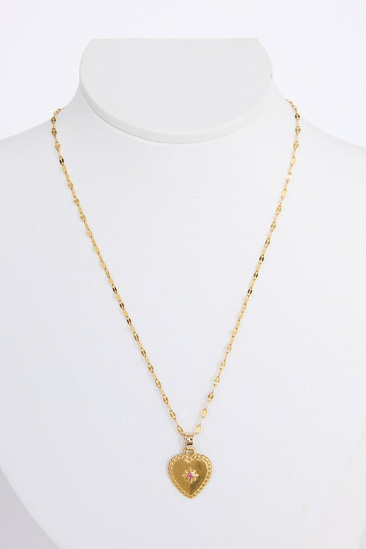 Aura Necklace in gold with heart pendant and stone detail, front view on white background