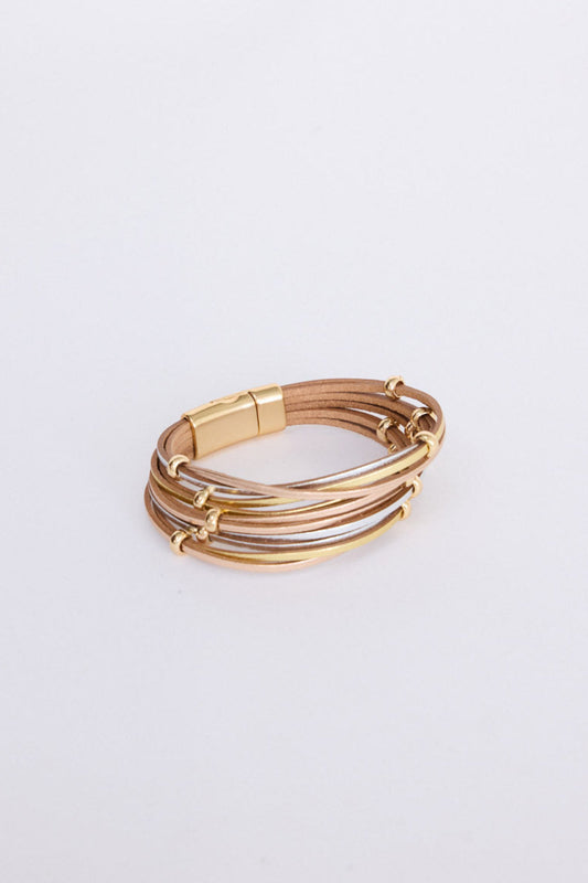 Ainsley Bracelet in metallic with fine metallic cords, angled view on white background