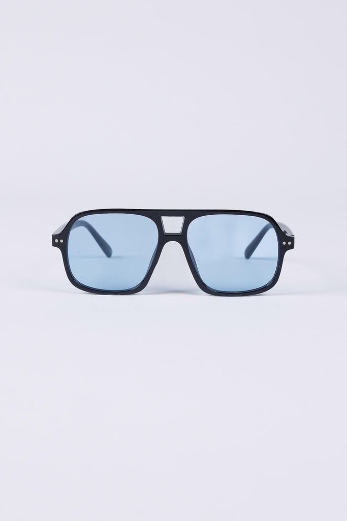 Sunglasses with blue lenses on a light gray background