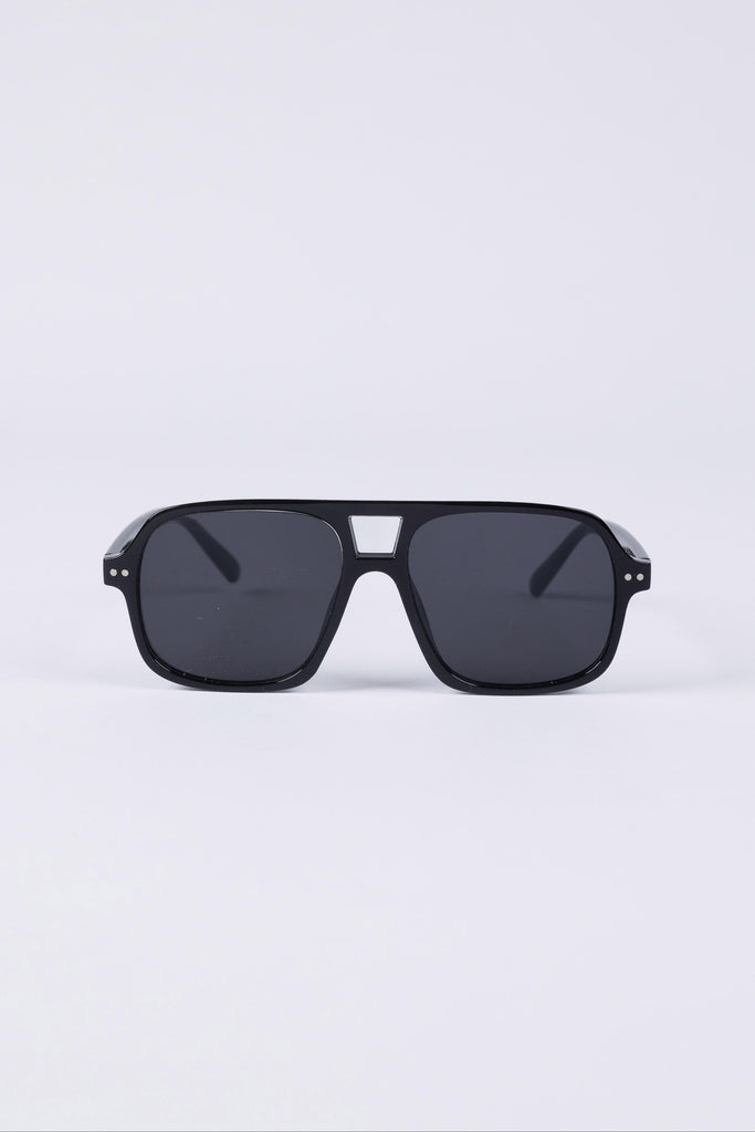 Black sunglasses on a light gray background