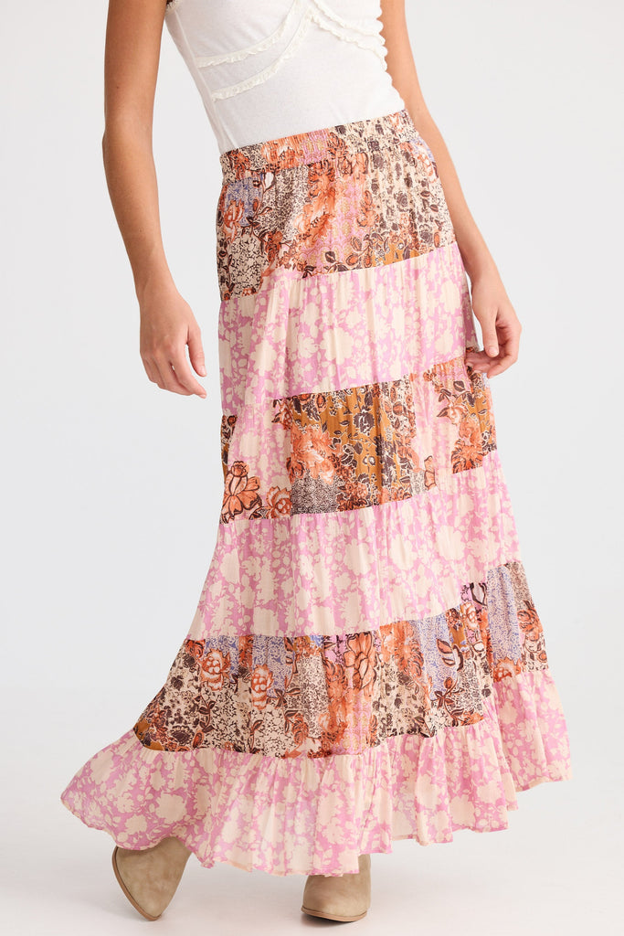 Patchwork skirt with floral patterns on a white background
