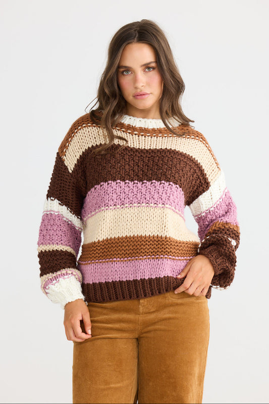 Close-up of Hudson Knit in brown multi showing ribbed crew neckline and long sleeves, detail view on white background