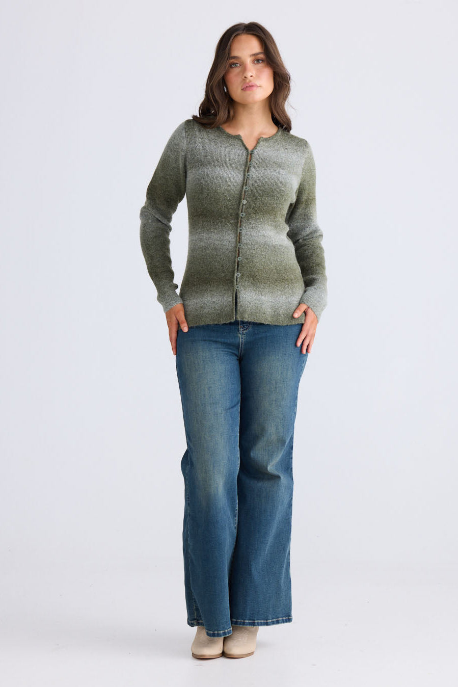 Model wearing Essence Knit Top in moss ombre with ombre knit design and long sleeves, back view on white background