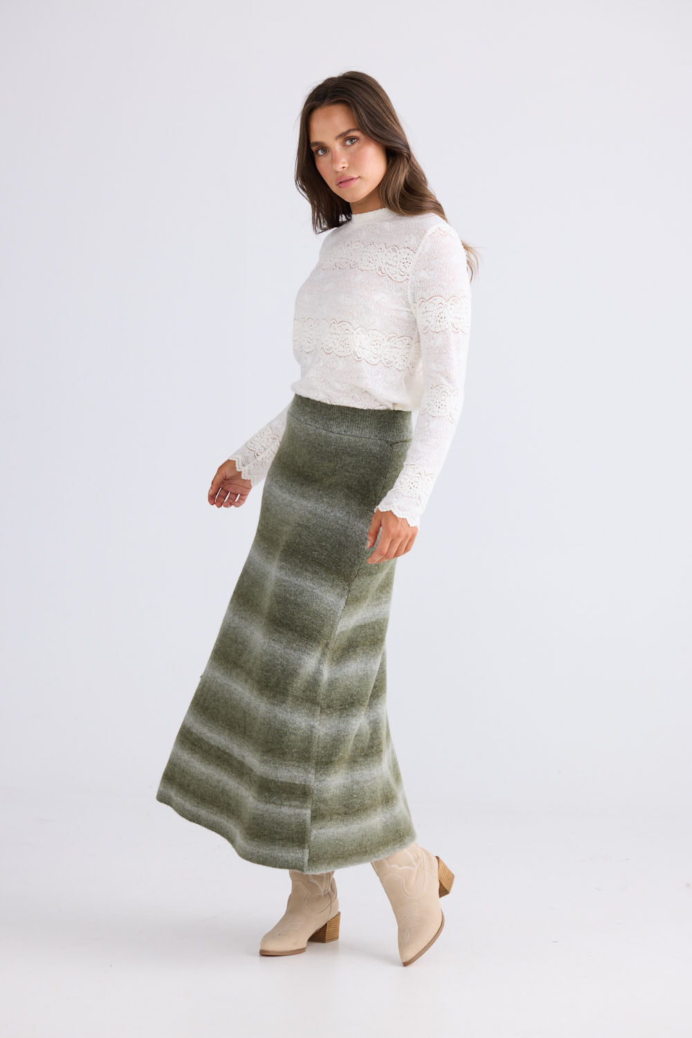 Close-up of Essence Knit Skirt in moss ombre showing ombre knit design, detail view on white background