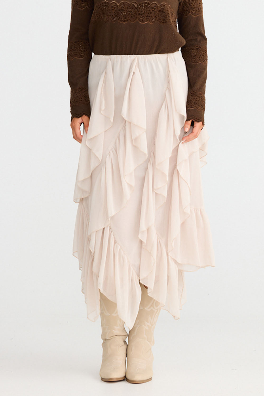 Model wearing Rafael Skirt in almond with elasticated waist, front view on white background