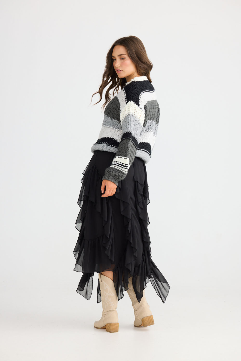 Close-up of Rafael Skirt in black showing elasticated waist, detail view on white background