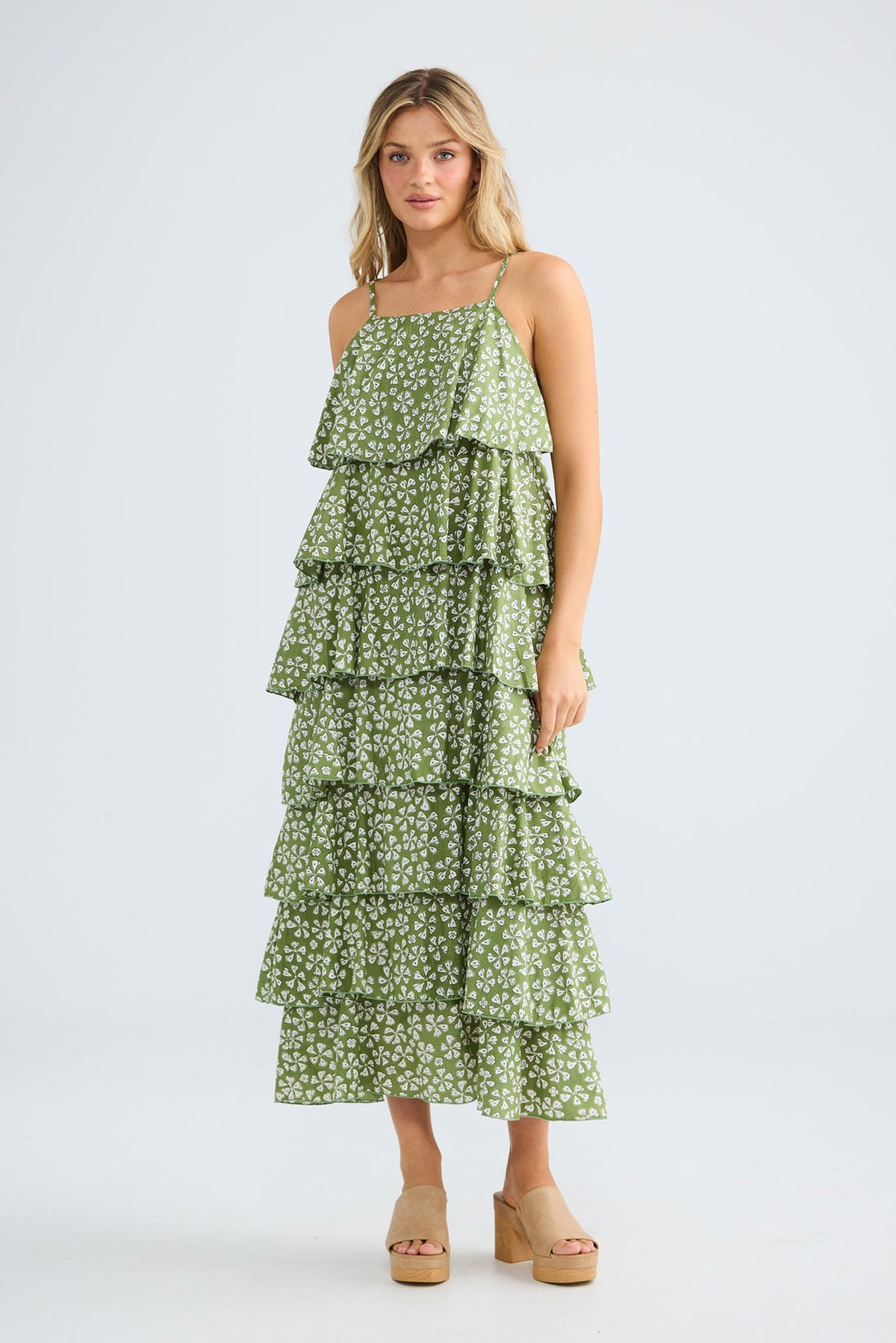 Model wearing Rue Maxi Dress in sage petal, front view.
