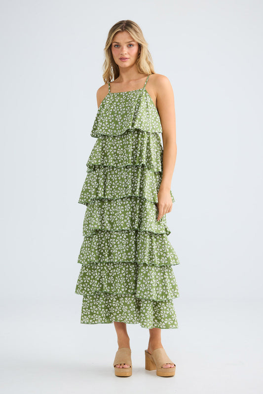 Model wearing Rue Maxi Dress in sage petal, front view.