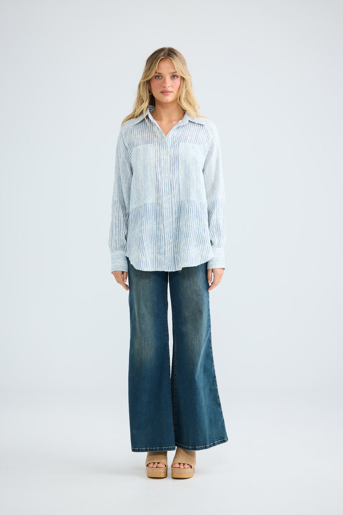 Bodhi Shirt in blue stripe with front chest pockets.