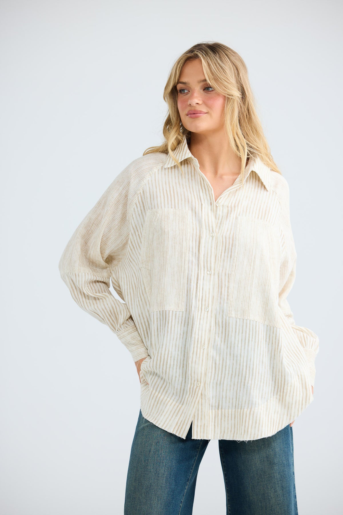 Bodhi Shirt in natural stripe, close front view showing the collar and chest pockets.
