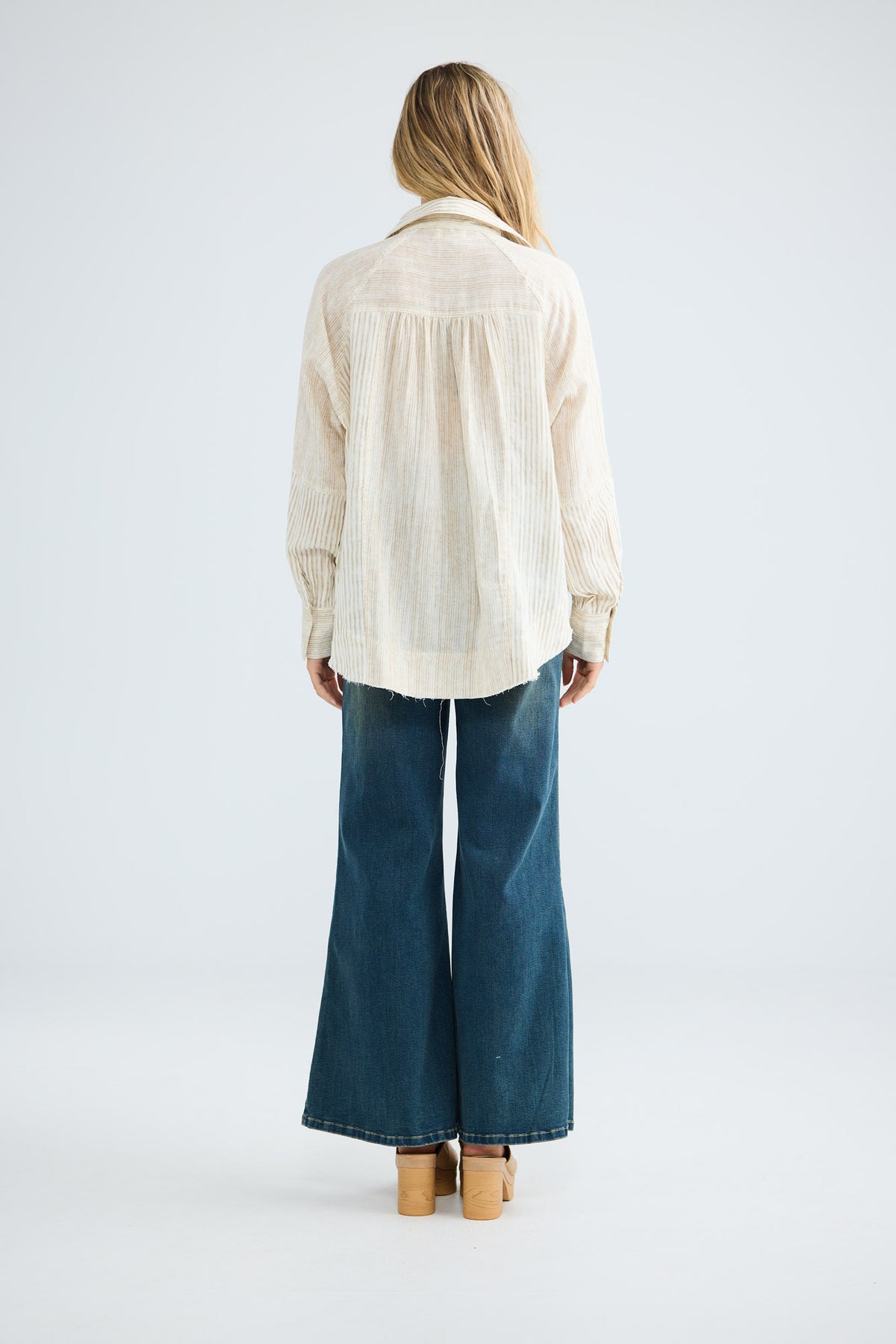 Bodhi Shirt in natural stripe, full-length back view.