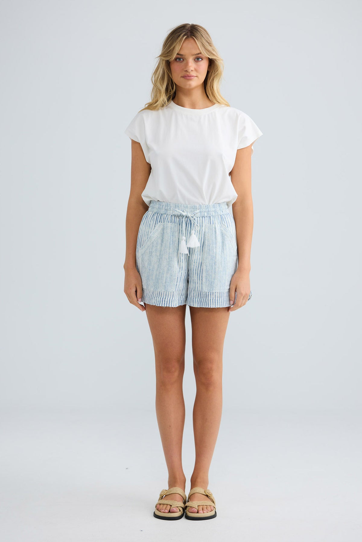 Bodhi Short in blue stripe with a tasselled drawstring tie.