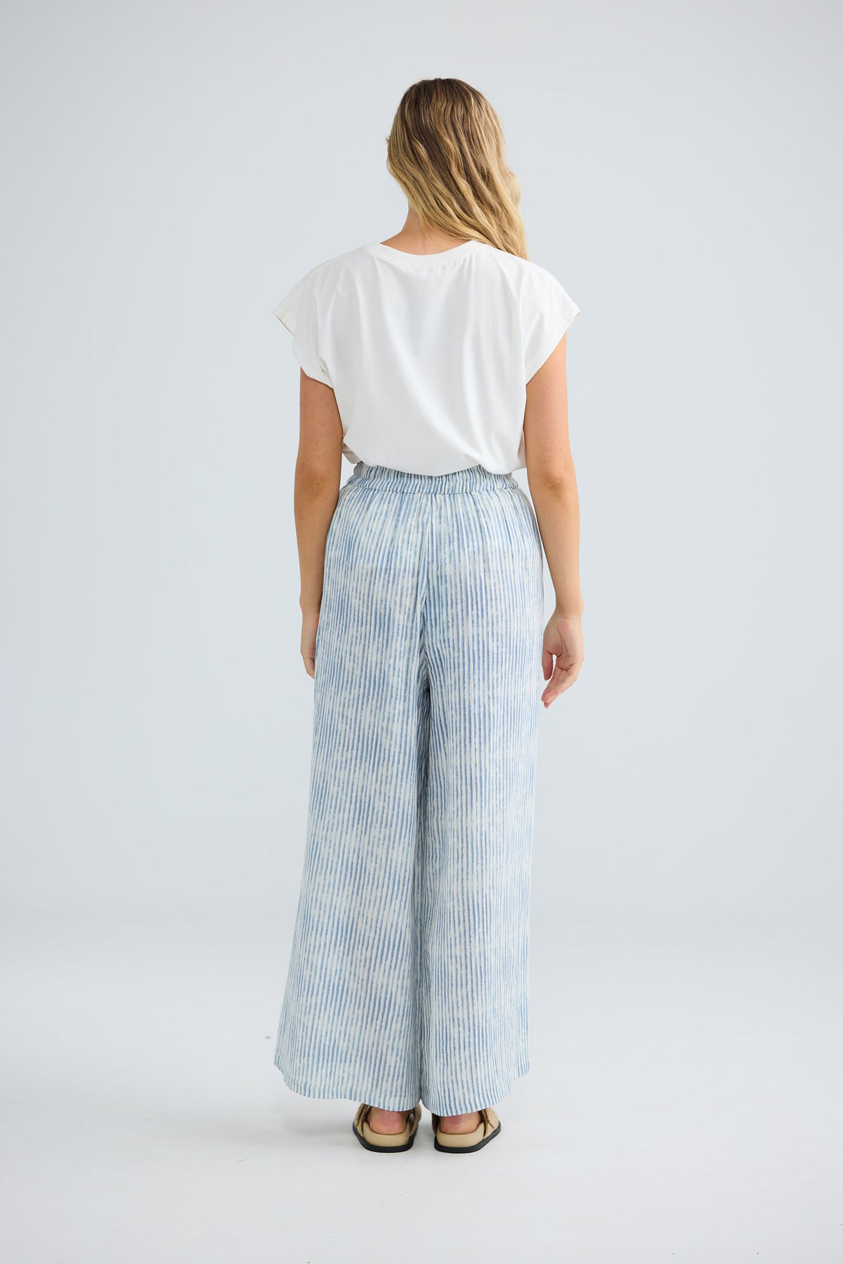 Freedom Pant in blue stripe, back view.