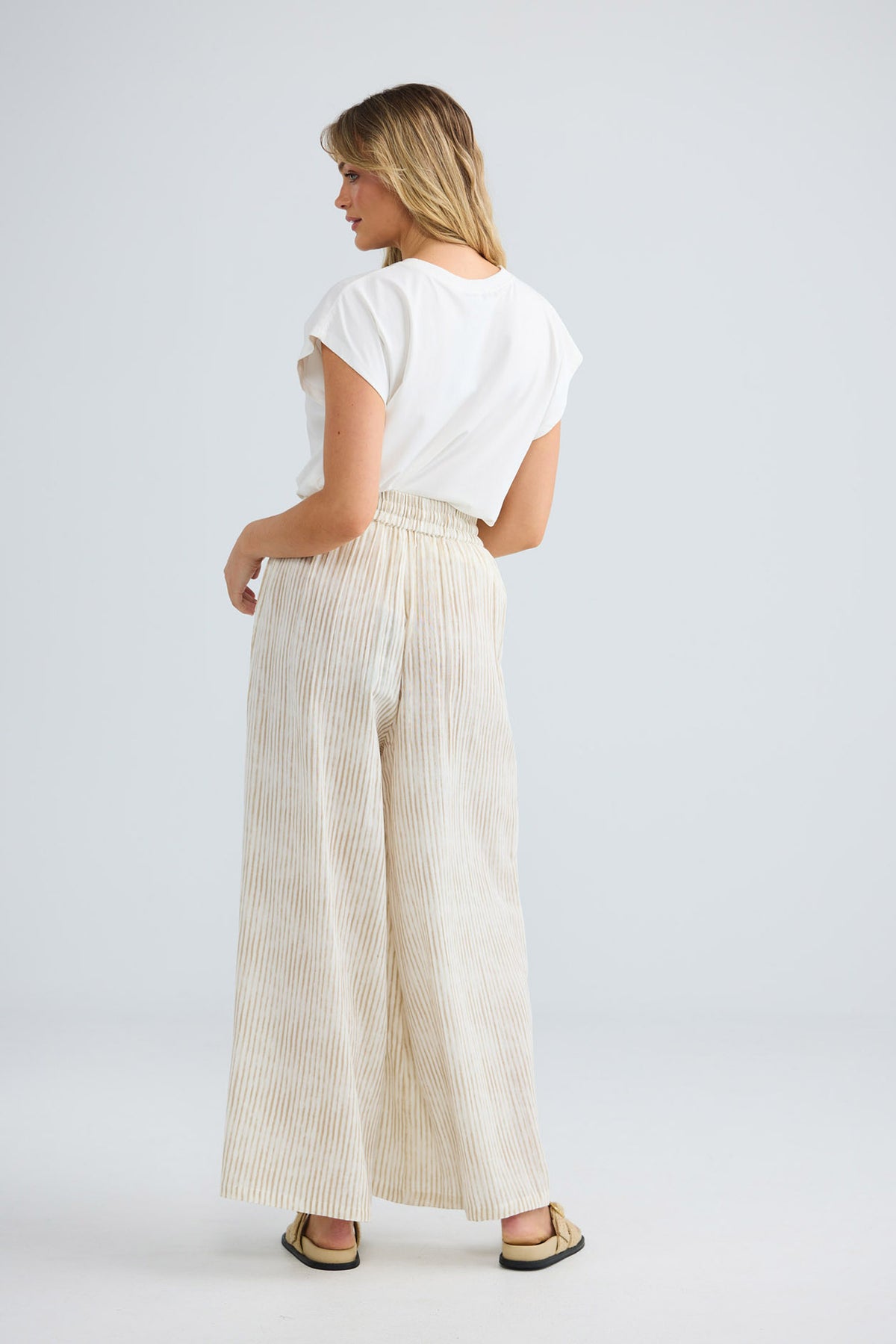 Freedom Pant in natural stripe, back view.