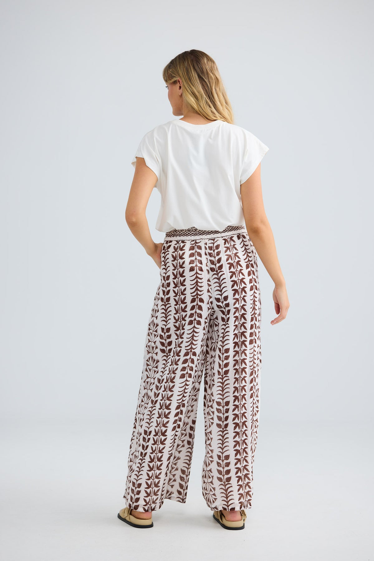 Freedom Pant in chocolate paro with a wide leg.