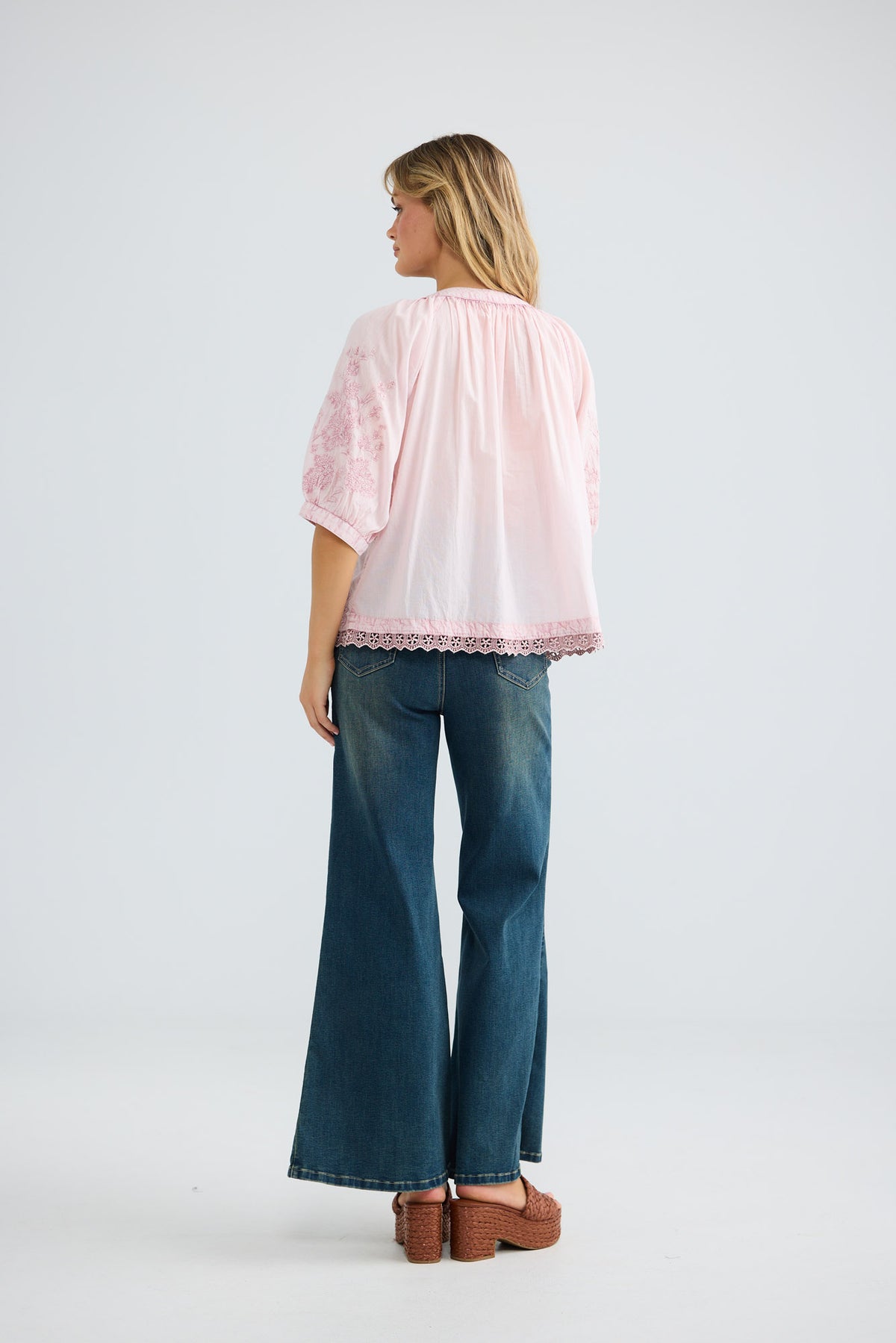Thistle Top in soft pink with a gathered round neckline.