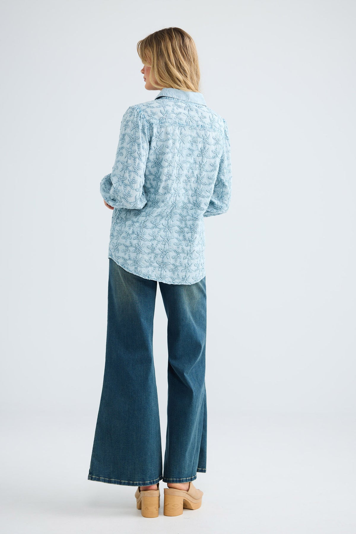 Flower Child Shirt in powder blue embroidery, back view.
