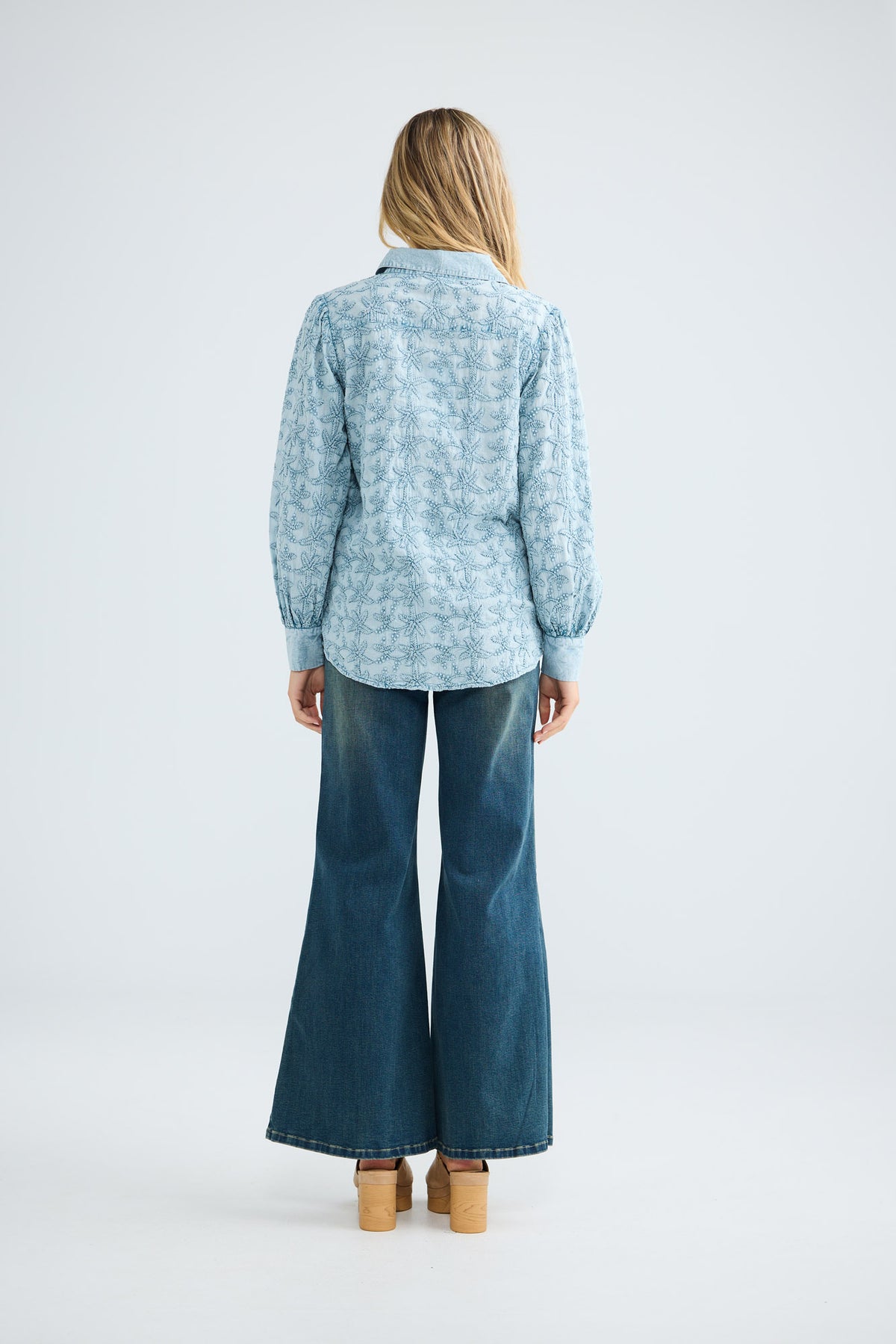 Flower Child Shirt in powder blue embroidery, full-length back view.