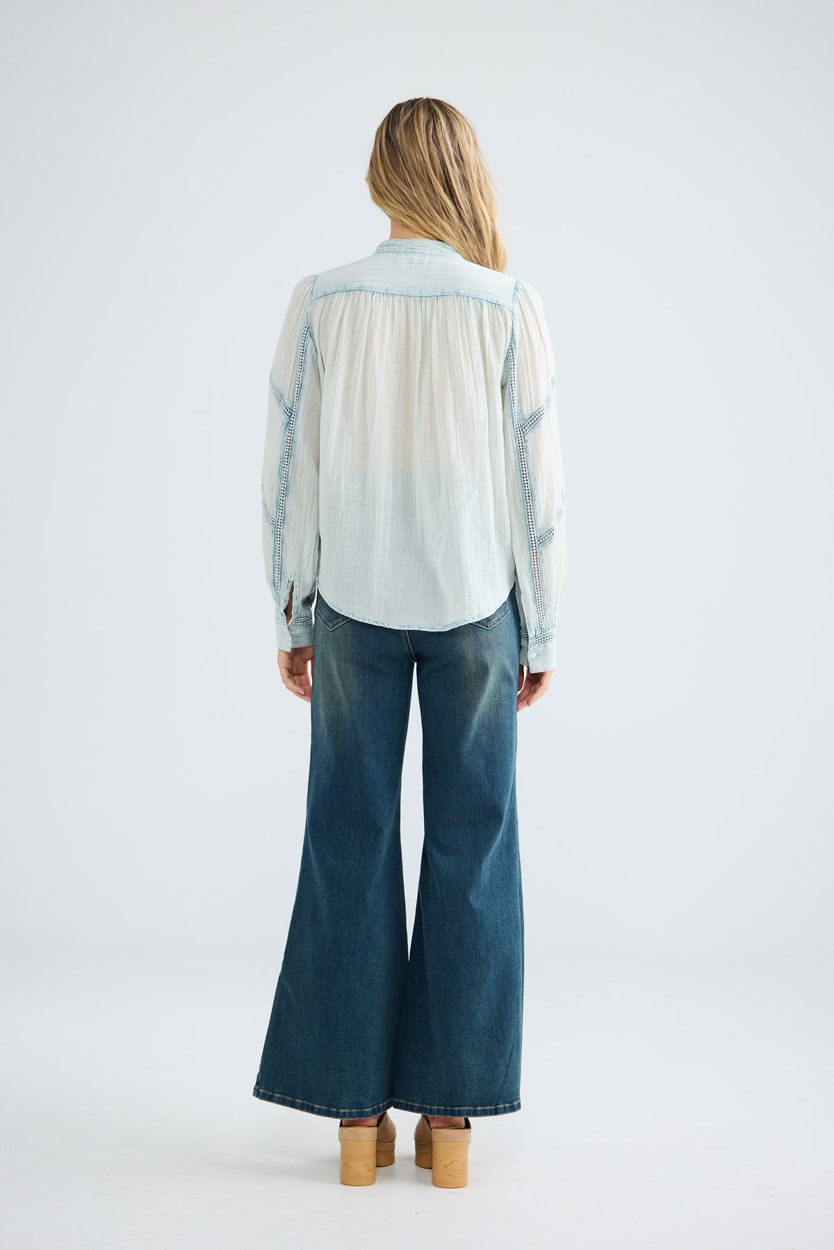 Amira Shirt in powder blue, back view.