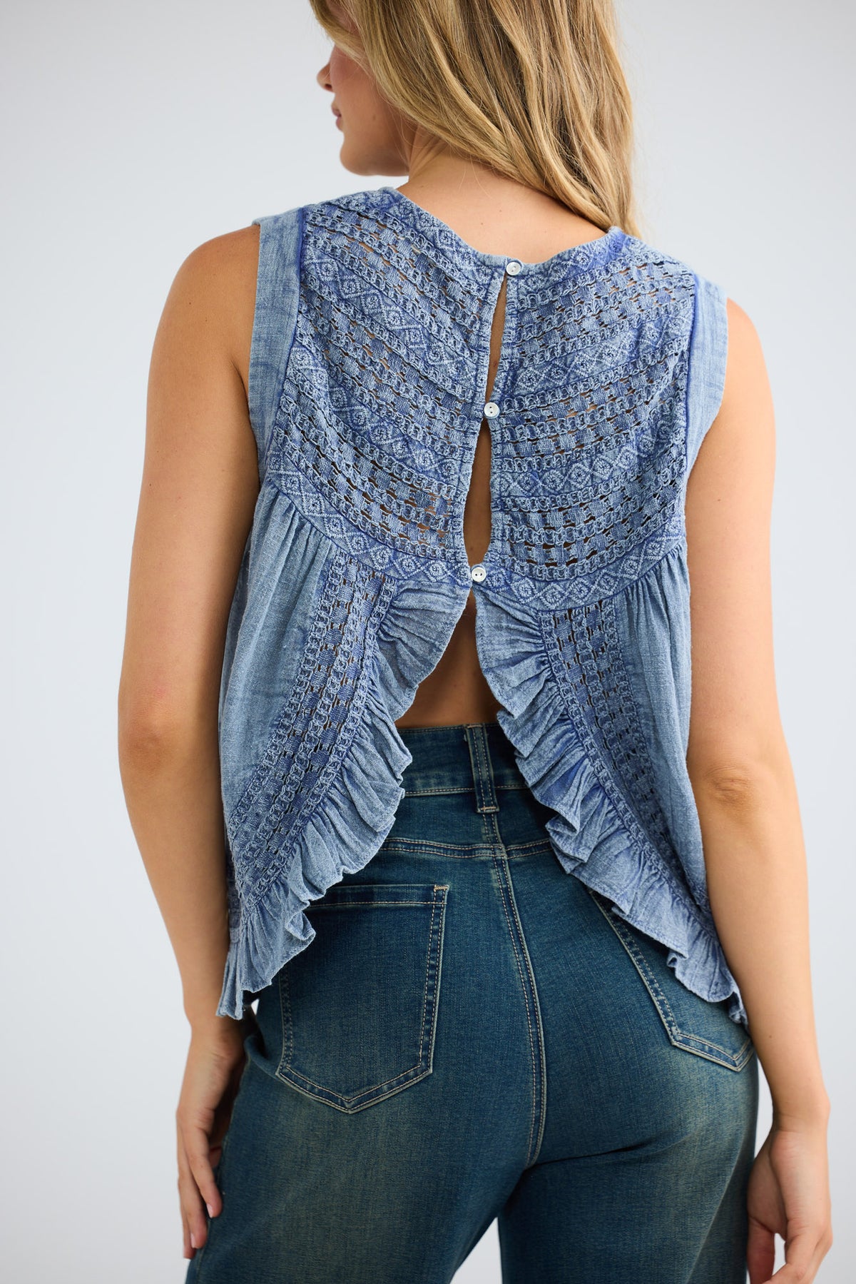Freesia Top in steel blue, back view showing the open tie back.
