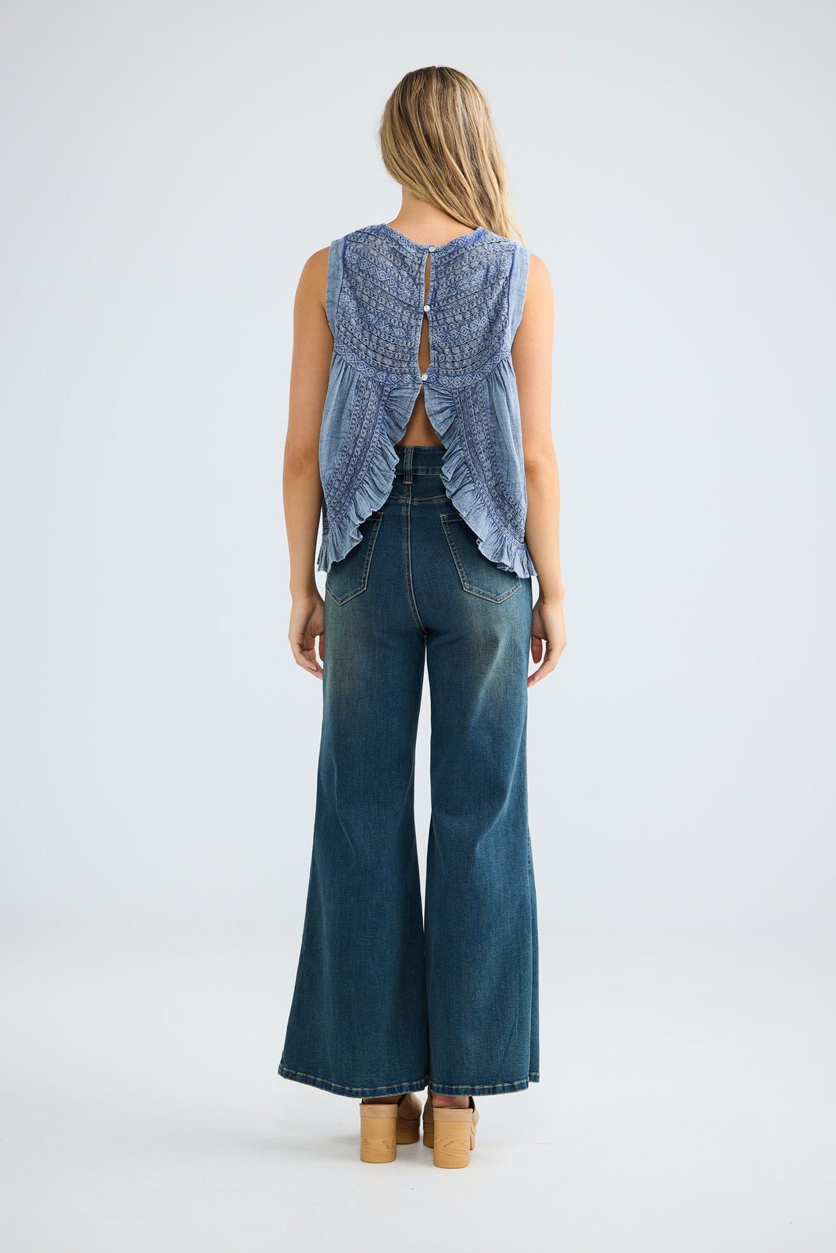 Freesia Top in steel blue, full-length back view.