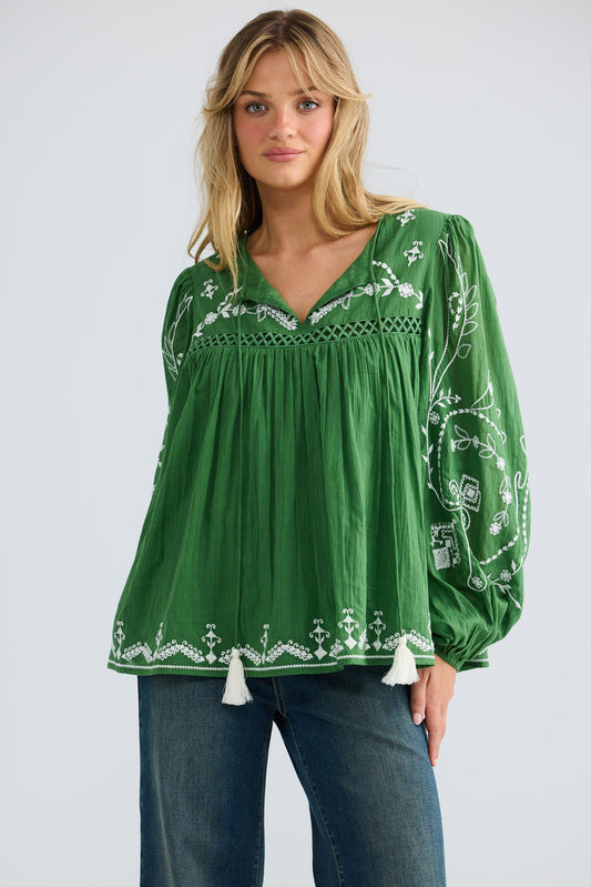 Sapphire Top in olive with white embroidery, close front view showing the tasselled neck ties.