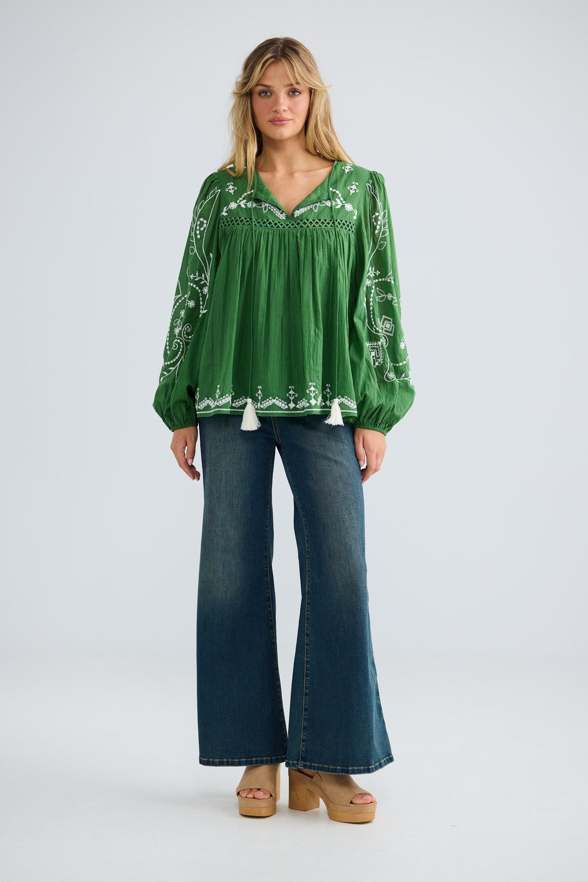 Sapphire Top in olive, front view showing the embroidered blouson sleeves.