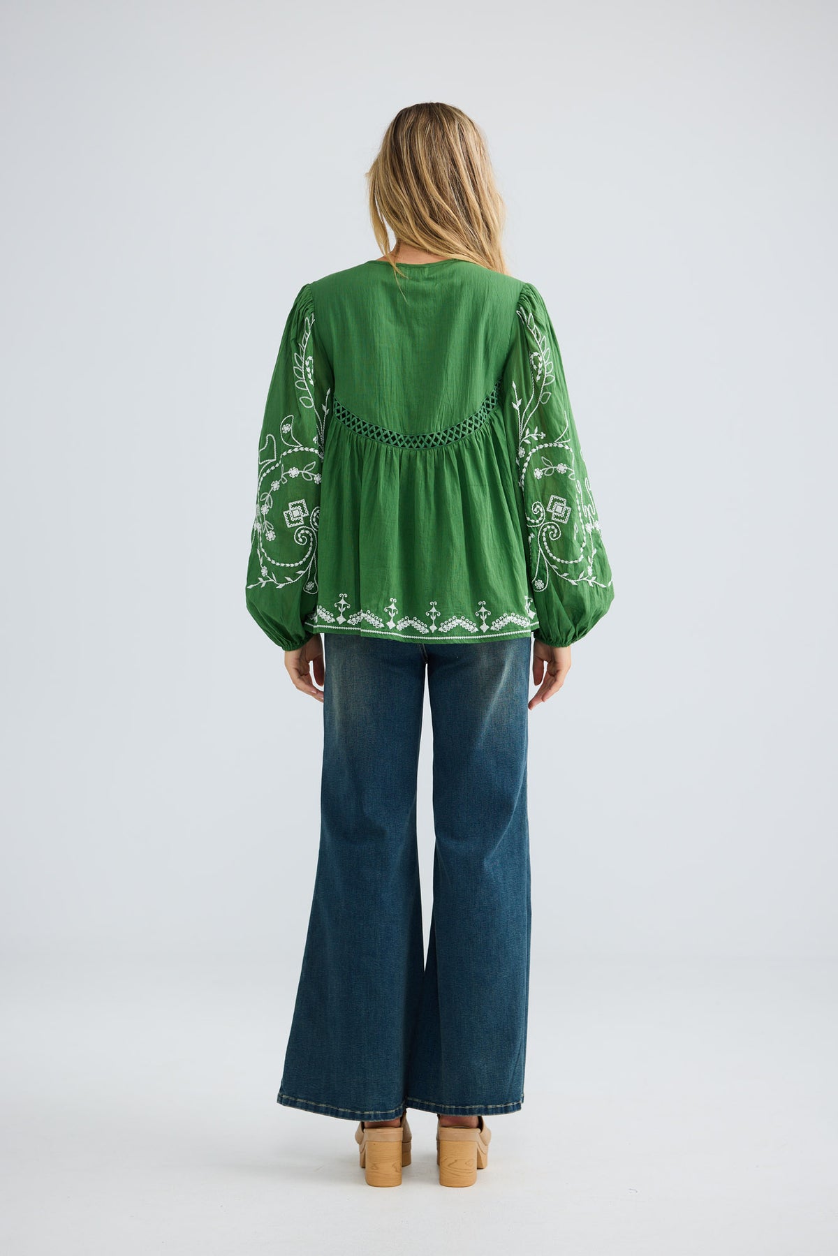 Sapphire Top in olive with white embroidery, full-length back view.