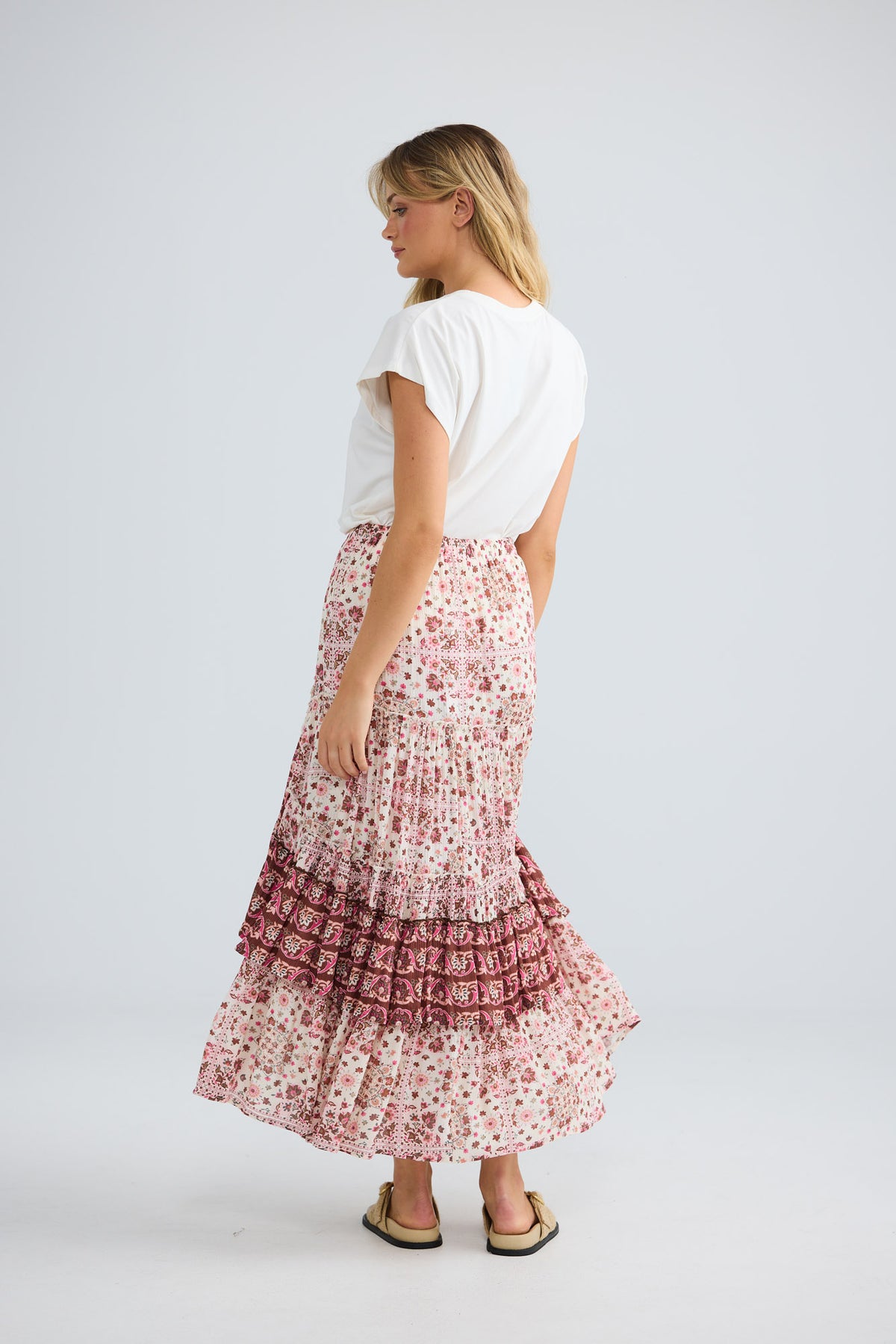 Sassy Skirt in chai floral with a high-low hem.