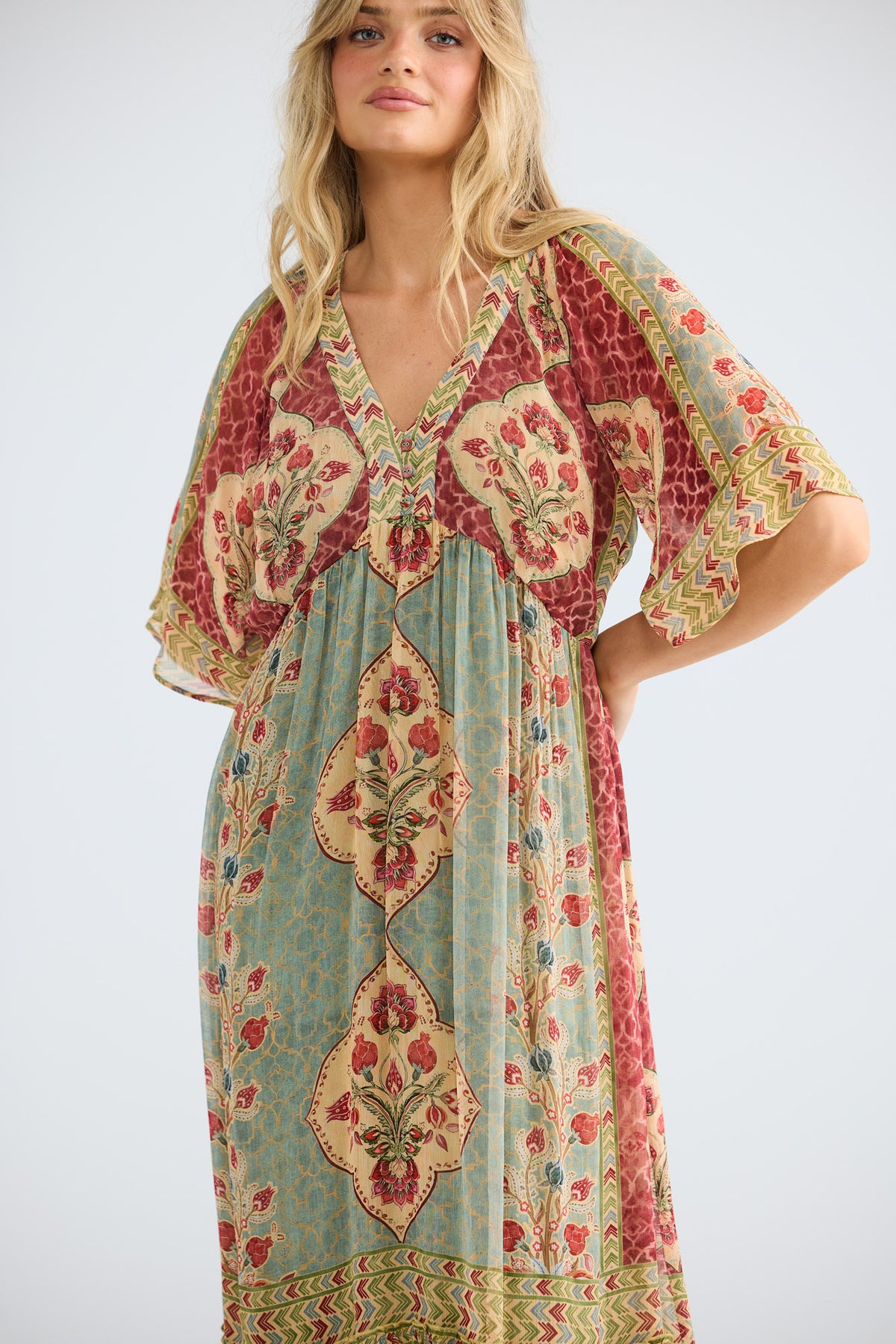 Tulara Dress in garden mist, close front view showing the V neckline.