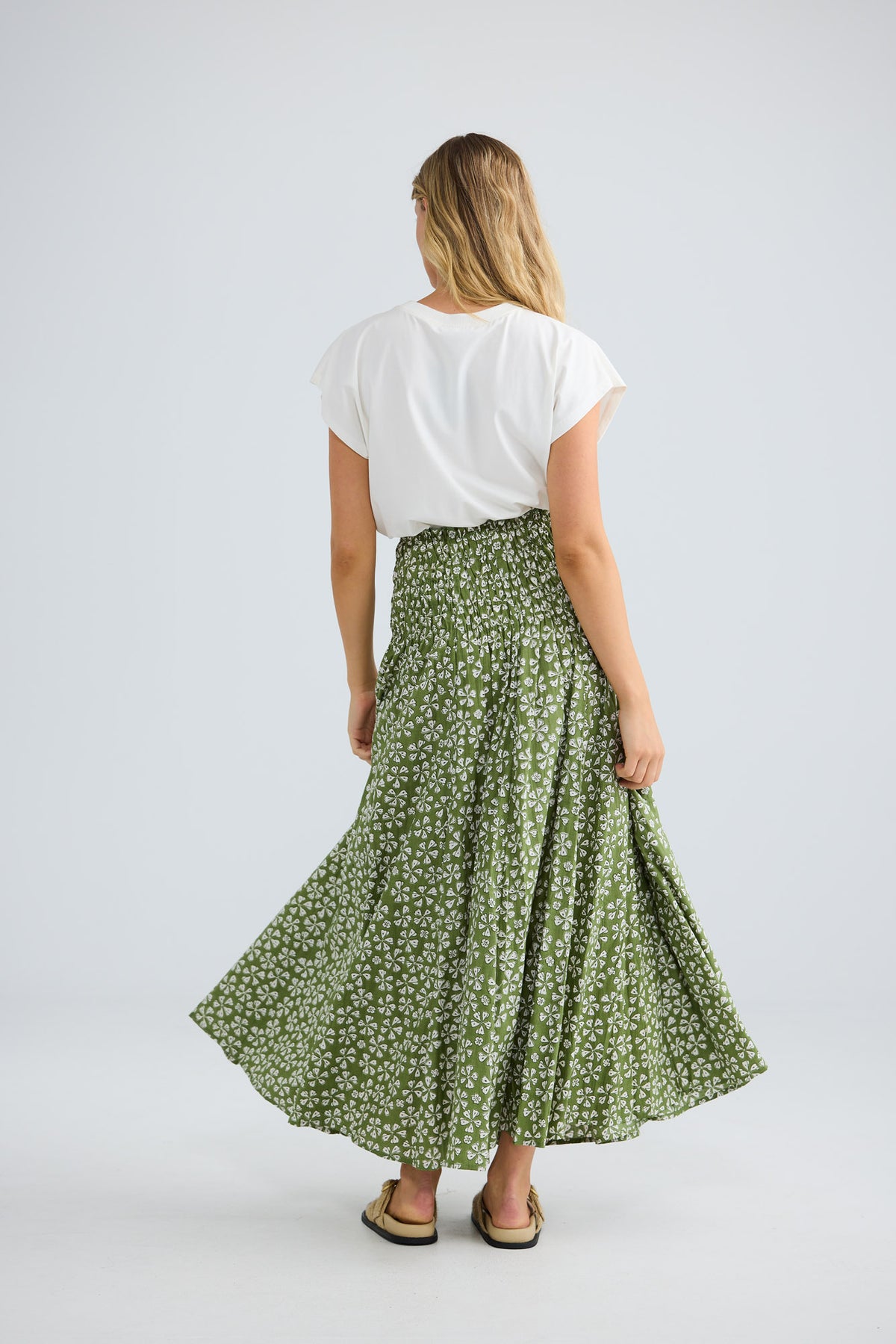 Balmoral Skirt in sage petal with a wide shirred waist.