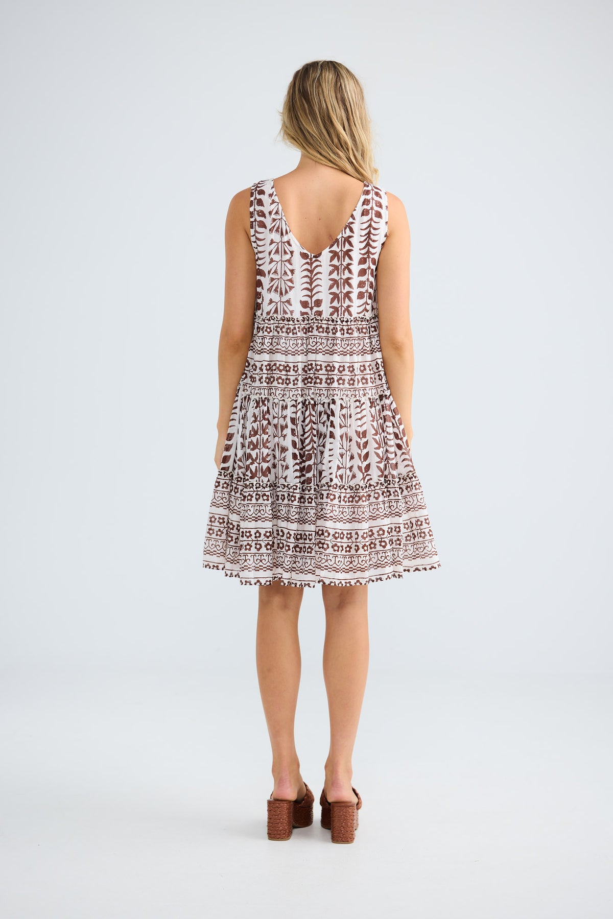 Lucky Charm Dress in chocolate paro with a deep V neckline.