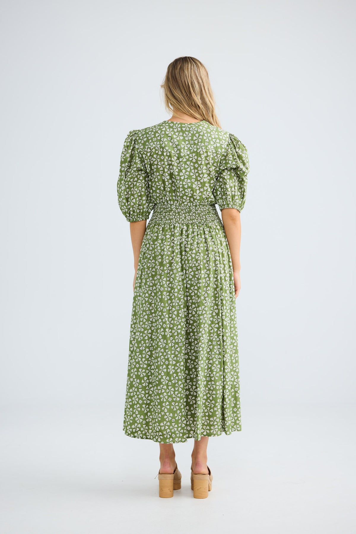 Halo Dress in sage petal with a button-through front.