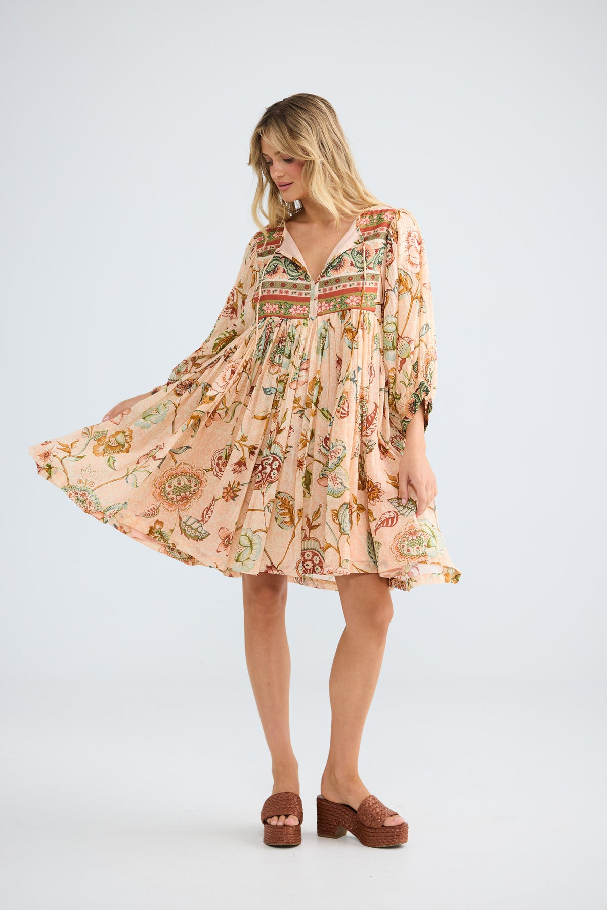 Wisteria Mini Dress in wildflower oasis with neck ties.