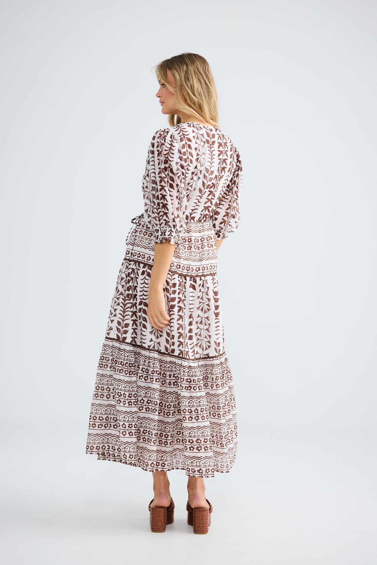 Tara Wrap Dress in chocolate paro with a tiered skirt.