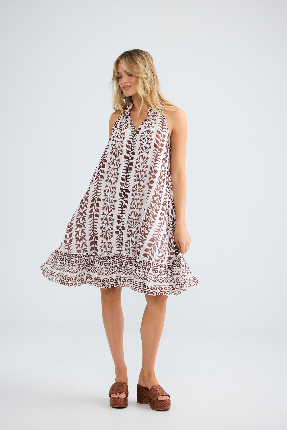 Tapas Dress in chocolate paro with a halter neckline.