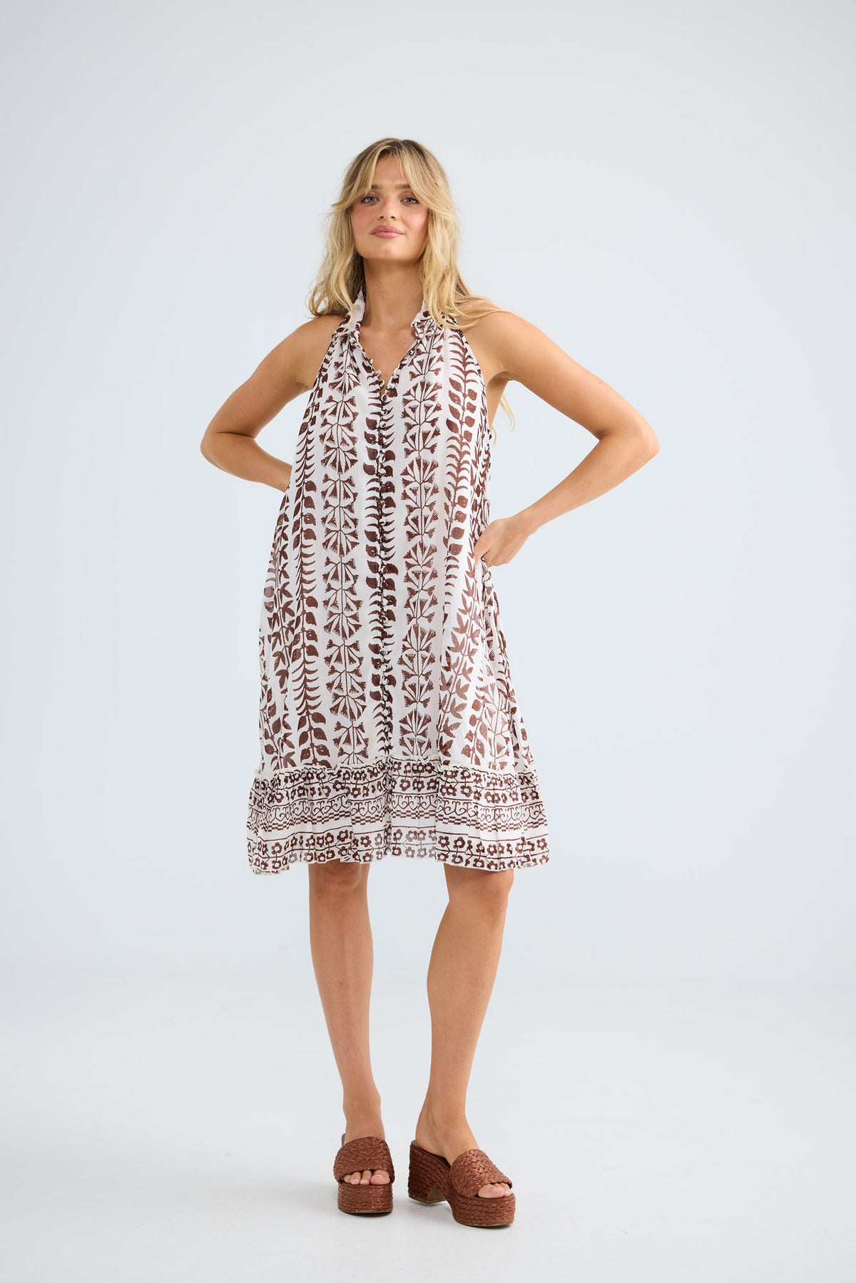 Tapas Dress in chocolate paro with a ruffled hem.