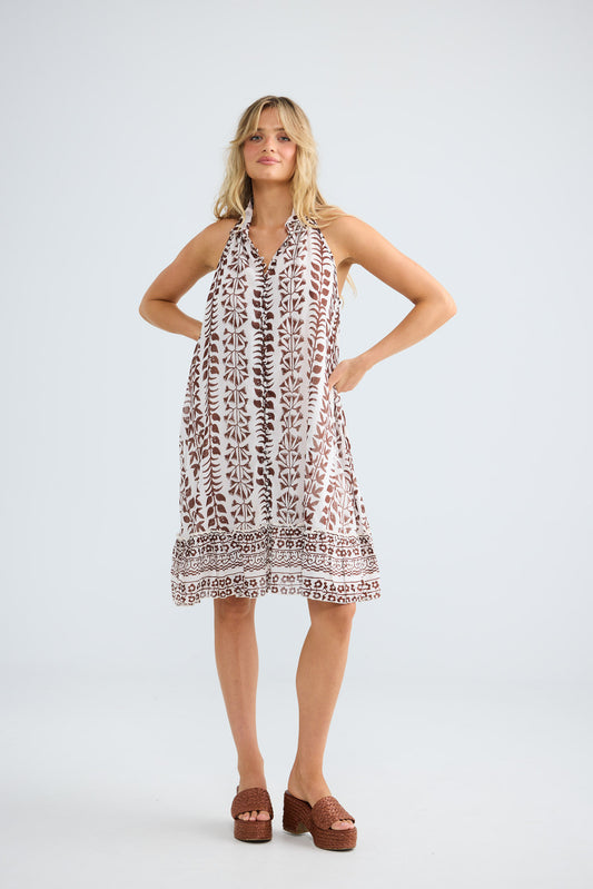 Tapas Dress in chocolate paro with a ruffled hem.